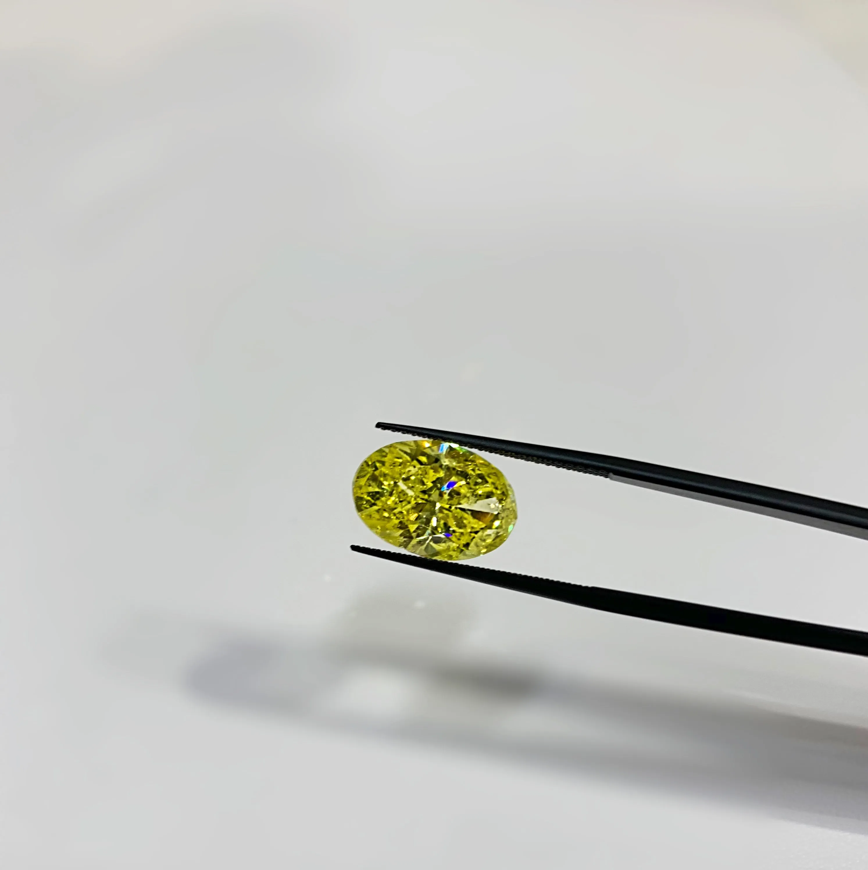 6.18 Carat Oval, Fancy Yellow, Color and Clarity Enhanced Diamond