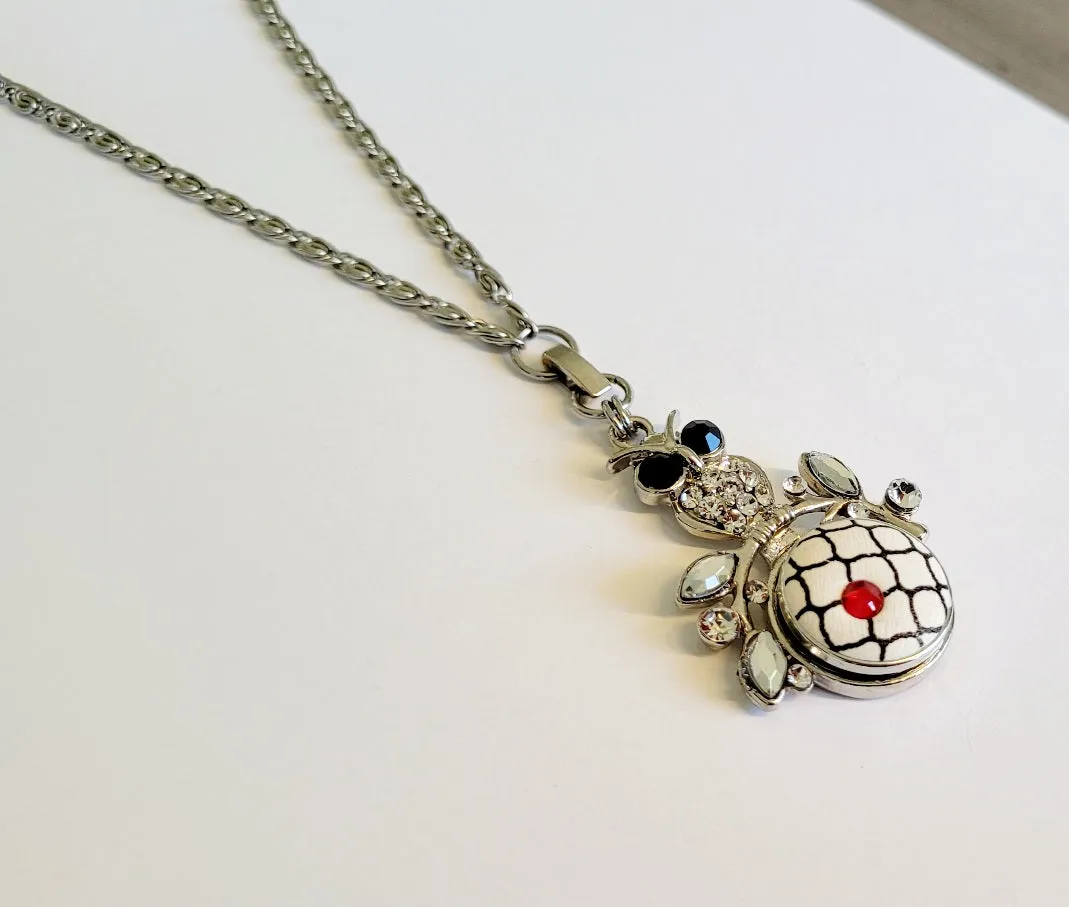 Necklace with detachable owl pendant and snap
