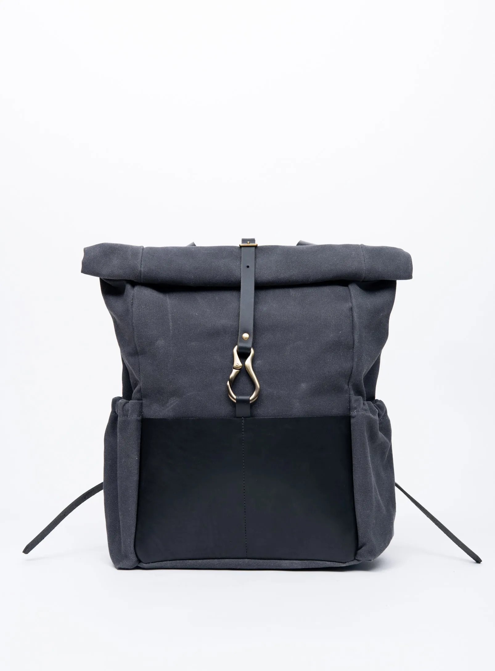 Roll top leather and waxed coton backpack DE LORIMIER model